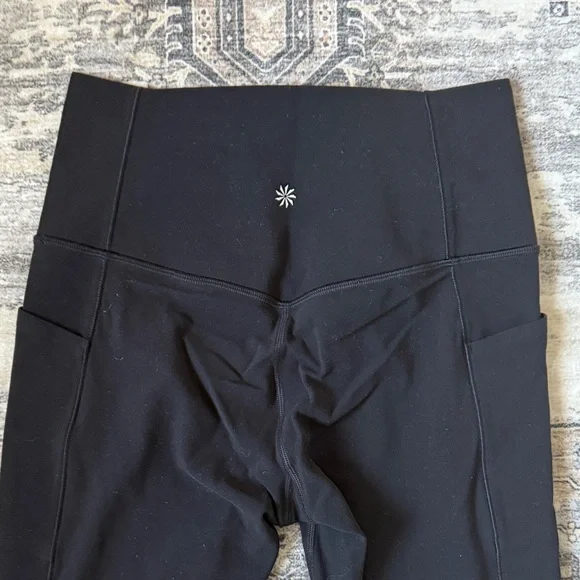 Athleta Black salutation stash pocket mesh panel. 7/8 Leggings - Picture 5 of 6